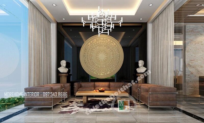 Trang trí nôi thất phòng tiếp khách văn phòng ấn tượng sửu dụng đá tự nhiên ốp tường, bộ sofa da cao cấp, đèn trang trí,.. với tông màu nâu trầm chủ đạo